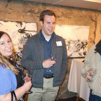 two men and one woman